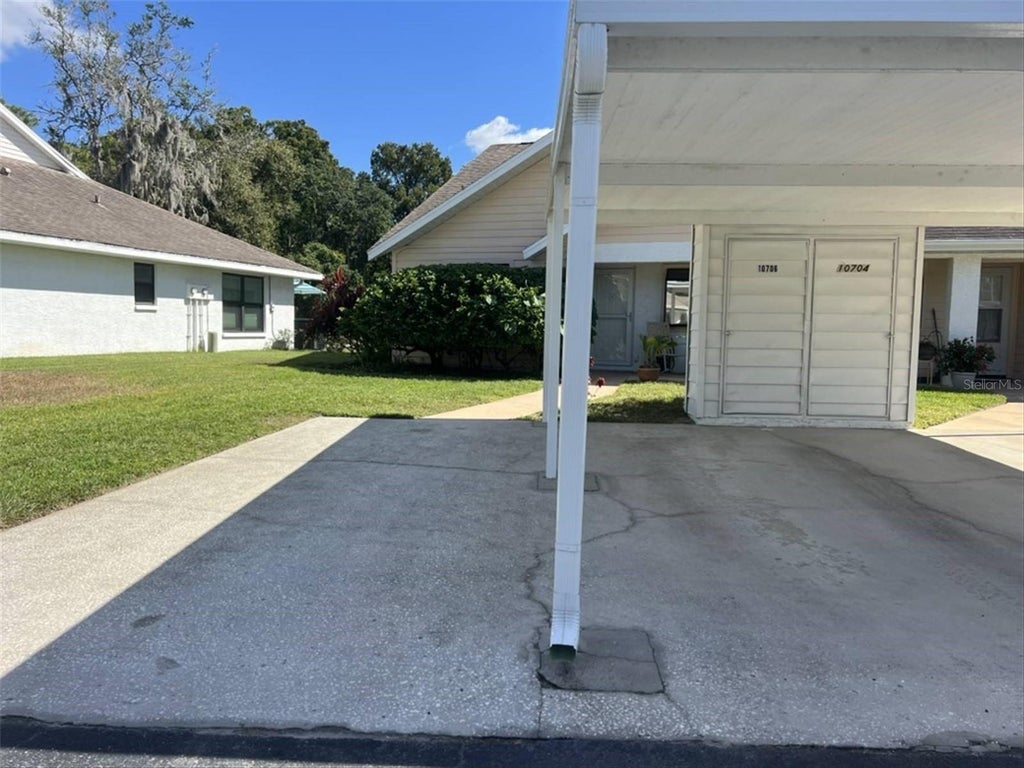 Photo of 10706 Laquinta Drive, New Port Richey, FL 34654 (MLS # TB8538912)