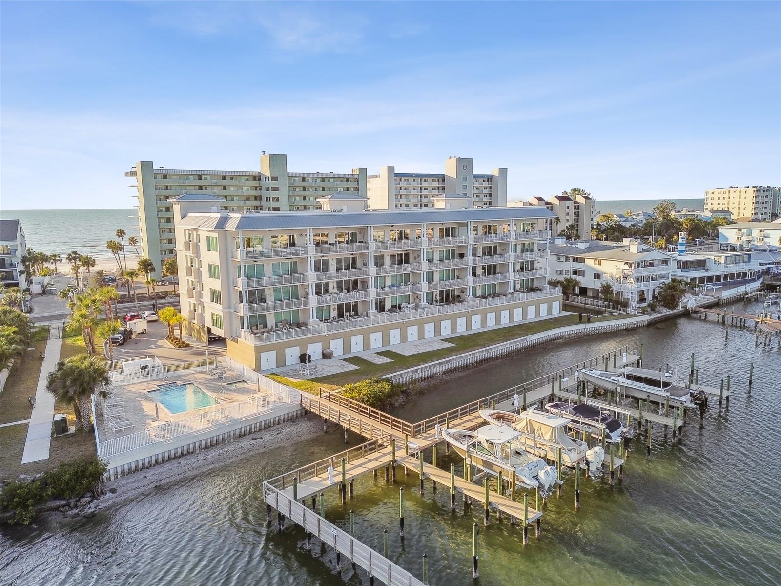No storm damage. No reserve assessments. Pure peace of mind.
Welcome to an extraordinary penthouse residence in the coveted enclave of Indian Shores, where refined elegance meets Florida’s most coveted coastal lifestyle. Boasting over 220 feet of unobstructed intracoastal waterway views and mere steps from the pristine sands of the Gulf, this home is a rare offering of scale, style, and sophistication.
Spanning 3,250 square feet, this three bedroom, three and a half bath retreat was designed to impress. A dramatic, oversized living room with soaring ceilings and walls of glass bathes the interiors in natural light, highlighting the seamless open floor plan which is perfectly suited for both grand entertaining and relaxed day to day living.
The chef’s kitchen is a masterpiece, anchored by top tier Wolf appliances including an induction range and microwave drawer, paired with a Subzero three piece system featuring refrigeration, wine storage, and freezer. A discreet hidden pantry doubles as a messy kitchen, providing abundant storage for small appliances and serviceware while keeping the main culinary space pristine.
Every element has been curated with sophistication including custom lighting installations, designer window treatments ranging from plantation shutters to automated shades, and bespoke storage solutions in every closet including thoughtfully designed cabana storage on the first floor.
From nearly every vantage point, the residence offers sweeping water views, an ever changing canvas of color and tranquility. Outdoors, direct public beach access lies just across the street, while a nearby dog park adds an effortless amenity for pet lovers.
This prime location places you moments from the culinary scene of Indian Rocks Beach including local favorites such as Salt Rock Grill and within easy reach of St. Pete Clearwater International Airport for seamless connectivity.
With no proposed assessments and a well funded community, this penthouse offers unmatched confidence alongside its undeniable beauty.
This is more than a residence. It is a private coastal retreat designed for the most discerning buyer. Schedule your private showing today and experience the best of Indian Shores living.