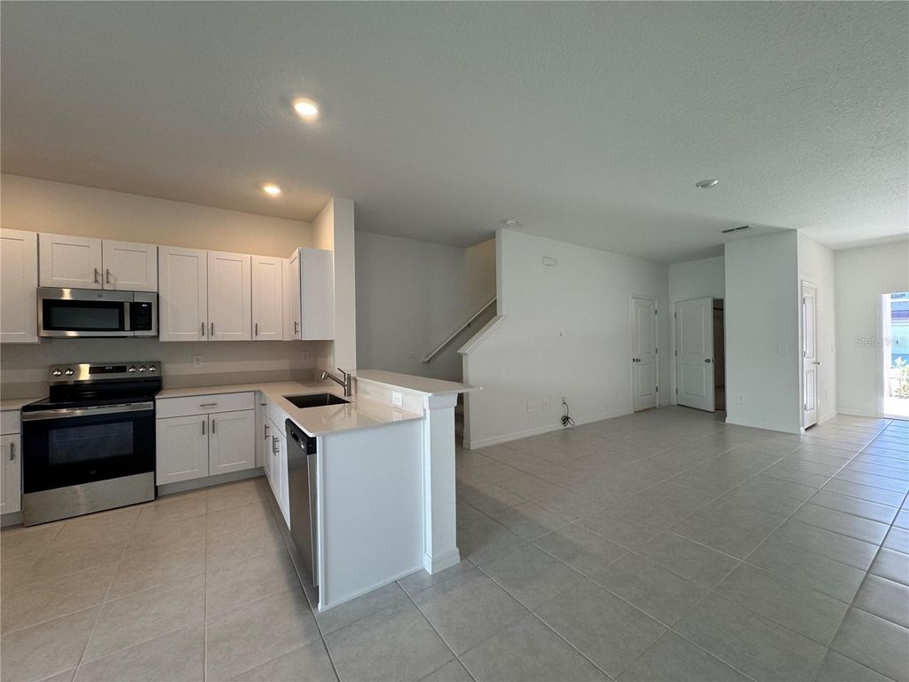 Photo of 10149 Trumpet Honeysuckle Way, Wesley Chapel, FL 33545 (MLS # O6350158)