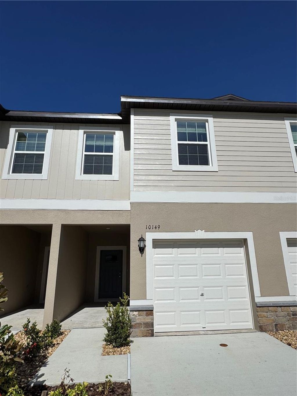 Photo of 10149 Trumpet Honeysuckle Way, Wesley Chapel, FL 33545 (MLS # O6350158)