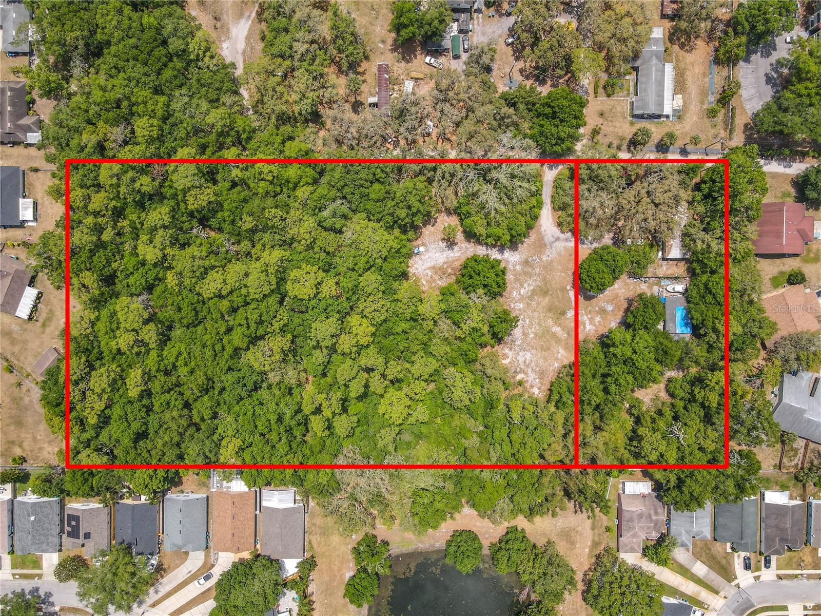 Build your dream home on 4.93 acres in Winter Park. No HOA, lot dimensions 665ft x 323ft, zoning A-2/FARMLAND RURAL, land use vacant residential. The sale price included 2 parcels 11 22 30 0000 00 125 & 11 22 30 0000 00 042 with a factory home 3/2, 1344 sf. heated, built in 1976, and a mobile home. Convenient to SR-551/ Goldenrod Rd, SR-426/Aloma Rd, SR-50/Colonial Dr, University Blvd, FL-417, Winter Park High School, Full Sail University, Barry University, Valencia College, UCF, AdventHealth Hospital, Downtown Orlando, and MCO/Orlando International Airport.