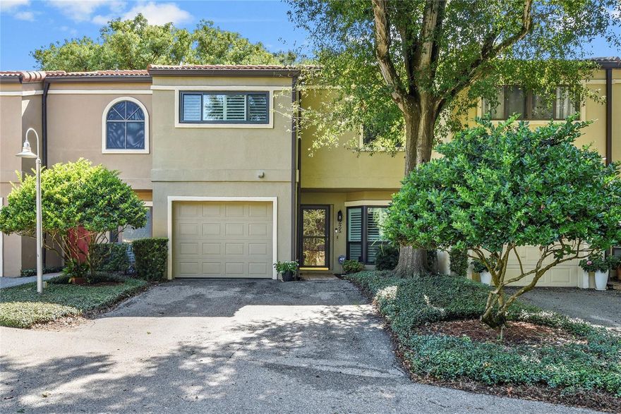Discover the perfect blend of style and location in this beautifully updated 3-bedroom, 2.5-bathroom townhome in the sought-after Moorings community. With 1,652 square feet of thoughtfully designed living space, this residence offers a bright, open floor plan enhanced by vaulted ceilings and an abundance of natural light.
The heart of the home is the stunning kitchen, showcasing white cabinetry, quartz countertops, stainless steel appliances, a decorative hood above the cooktop, and a classic subway tile backsplash. A charming bay window creates the perfect breakfast nook, while the open-concept living and dining areas provide ideal space for entertaining and everyday living. A wood-burning fireplace adds warmth and ambiance to the living room, creating a cozy focal point.
Step through French doors into a sun-drenched sunroom with walls of windows overlooking tranquil community green space – your own private retreat for morning coffee or evening relaxation. Luxury vinyl plank flooring flows throughout the main level, complemented by plantation shutters and fresh paint.
The second floor houses all three generously sized bedrooms, including a serene primary suite with a completely renovated en suite bathroom featuring a double sink vanity, walk-in shower, and spacious walk-in closet with custom built-ins. The updated hall bath offers a tub/shower combo and single-sink vanity. The second bedroom also features custom built-in closet organizers for added storage and convenience. Additional features include ceiling fans, interior laundry, and an attached one-car garage.
Living in The Moorings means enjoying exclusive amenities, including a community dock on Lake Maitland, sparkling pool, and clubhouse. The location is unbeatable – just moments from Maitland's charming Lake Lily Park and its popular weekly farmer's market, five minutes from the upscale shops and dining of Park Avenue, and surrounded by the best of Central Florida's shopping, restaurants, and entertainment.