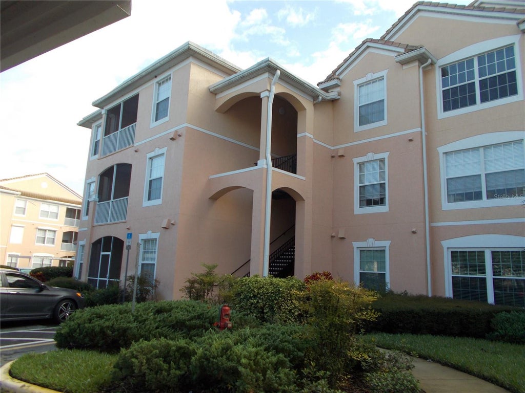 Photo of 13548 Turtle Marsh Loop #420, Orlando, FL 32837 (MLS # O6428460)