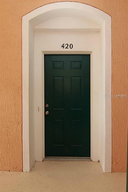 Photo of 13548 Turtle Marsh Loop #420, Orlando, FL 32837 (MLS # O6428460)