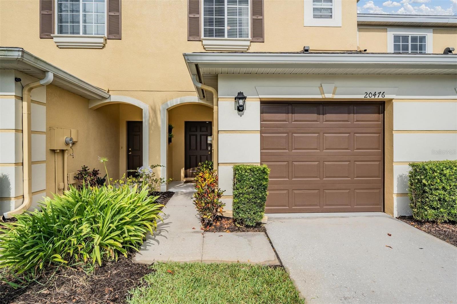 Photo 2 of 32 of 20476 NEEDLETREE DRIVE townhome