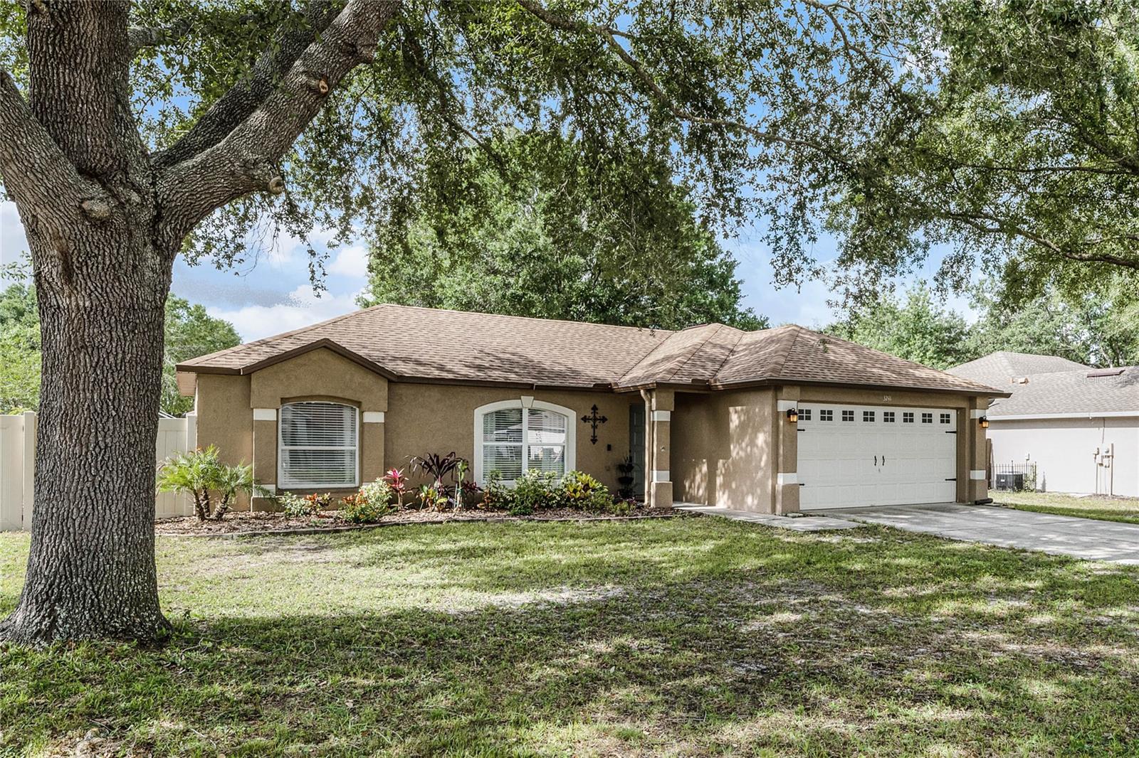 Welcome to your new Timbercrest home in Deltona! This charming and move-in ready 3 bedroom, 2 bathroom house is located on a quiet street and offers plenty of space for comfortable living. Having been sold within the family since the day it was built, The house has been well-maintained and updated over the years. Featuring a brand new roof in 2018 and a new AC in 2019, you'll have worry-free living for years to come. The fully updated kitchen features stainless steel appliances, quartz countertops, and modern 15 in. deep cabinets, making meal prep a breeze and adding a touch of elegance to the space. The bedrooms are spacious and cozy, providing a peaceful retreat after a long day. This home also boasts a convenient laundry room with plenty of storage, and the attached 2-car garage add to the storage space.
The backyard is perfect for outdoor activities, gardening, relaxing, or to enjoy the summer. With a screened porch, you can enjoy the outdoors without the bugs, and the fenced yard offers privacy and security for you and your family. Located in a highly desired neighborhood with no HOA, this house is just minutes away from shopping, dining, and entertainment, with only a few minute walk to Deltona's best High School and a moments drive to I-4!! Don't miss the opportunity to make this house your home. Schedule a showing today!