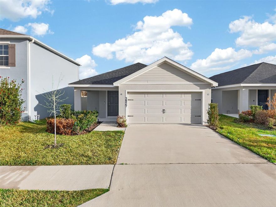 Do you want to own a true one of a kind? A true one of one? This is truly a special opportunity to own a home that is as unique as it is inviting. This property is the FINAL Amarylis model available in the entire community — a rare find that offers both distinction and immediate availability. Unlike new construction opportunities that often involve lengthy build timelines, unexpected delays, and months of uncertainty, this home is completely MOVE-IN READY. No waiting, no construction process, no guesswork — just the ability to step inside and immediately begin enjoying your new home.

From the moment you enter, the home creates a lasting impression. The soaring ceilings and welcoming walk-in foyer set the tone for a bright, open, and airy living experience. The elevated ceiling height dramatically enhances the feeling of space, giving the home a grand and expansive presence that feels far larger than expected. Natural light pours through the living areas, creating a warm and uplifting atmosphere throughout the day.

Designed for modern living and meaningful moments, the open-concept floor plan encourages connection and comfort. The seamless flow between the kitchen, dining, and living spaces makes everyday life effortless while providing the perfect backdrop for gatherings, celebrations, and quiet evenings at home. Luxury vinyl flooring throughout the main living areas adds both style and durability, creating a cohesive and low-maintenance environment that complements any design aesthetic.

Built in 2023, this residence offers the peace of mind that today’s buyers value most. Everything reflects newer construction standards, meaning you can enjoy your home without the typical concerns of replacing major components or tackling costly updates. Simply move in and focus on living. Adding even more value and convenience, the home includes a full security system with installed cameras that convey with the property, providing comfort and confidence from day one.

With three bedrooms and two bathrooms, this home offers flexibility for a variety of lifestyles. Whether accommodating guests, creating a home office, or designing a playroom, the space adapts beautifully to your needs. The primary suite provides a relaxing retreat, complete with a spacious walk-in closet and a well-appointed bathroom featuring a dedicated vanity seating area — a small but meaningful touch that enhances everyday routines.

Step outside and the lifestyle continues. A charming front porch offers a welcoming space to relax and unwind, while the backyard provides the perfect setting for entertaining, grilling, or enjoying peaceful outdoor moments. The included playground set adds both convenience and enjoyment.

The location of the home is equally appealing, offering exceptional convenience with close proximity to a variety of shopping, dining, and everyday essentials. Residents also benefit from the community’s amenities, including a large resort-style pool with abundant seating and shaded cabana areas, as well as recreational spaces designed for enjoyment and leisure.

This is more than just a home — it is an opportunity to skip the wait, avoid construction uncertainties, and immediately embrace a space designed for comfort, connection, and everyday living. Don’t miss your chance at beautiful, easy living!