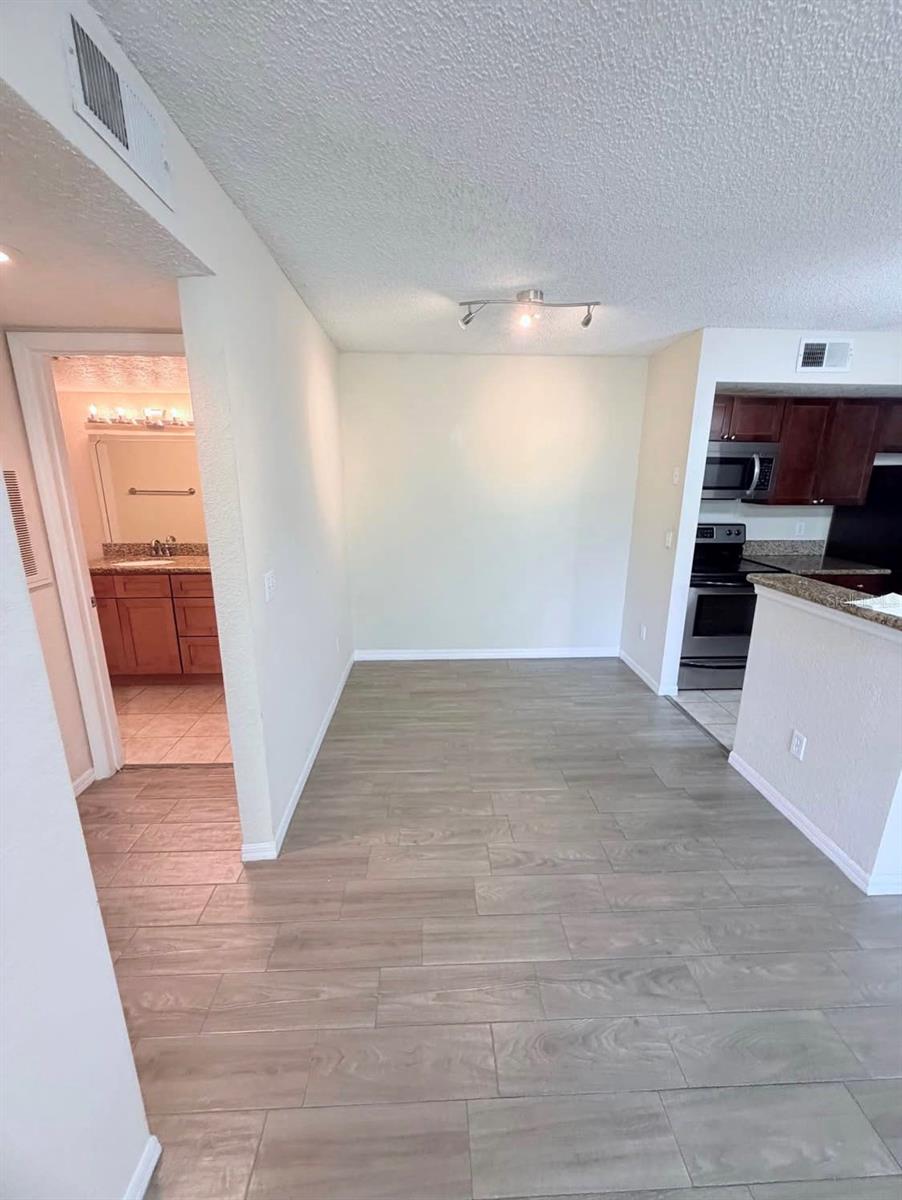 Photo of 5112 Conroy Road #13, Orlando, FL 32811 (MLS # O6448575)