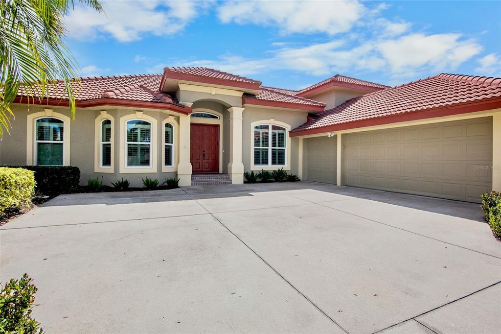 Photo of 4980 Sabal Lake Circle, Sarasota, FL 34238 (MLS # A4685073)