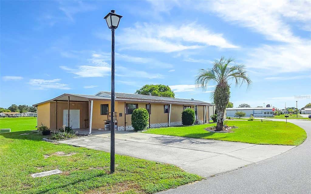 Photo of 36301 Coronet Way, Zephyrhills, FL 33541 (MLS # TB8541478)
