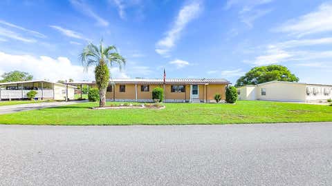 Photo of 36301 Coronet Way, Zephyrhills, FL 33541 (MLS # TB8541478)