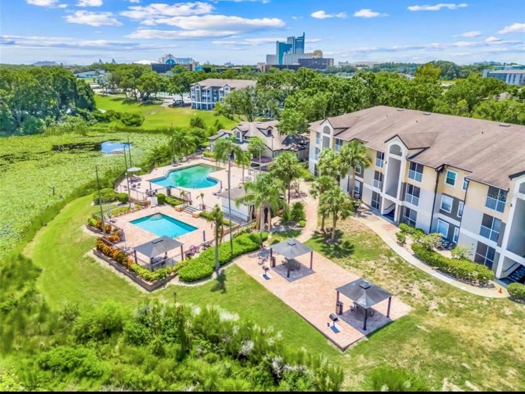 Photo of 7630 Pissarro Drive #16308, Orlando, FL 32819 (MLS # O6386257)