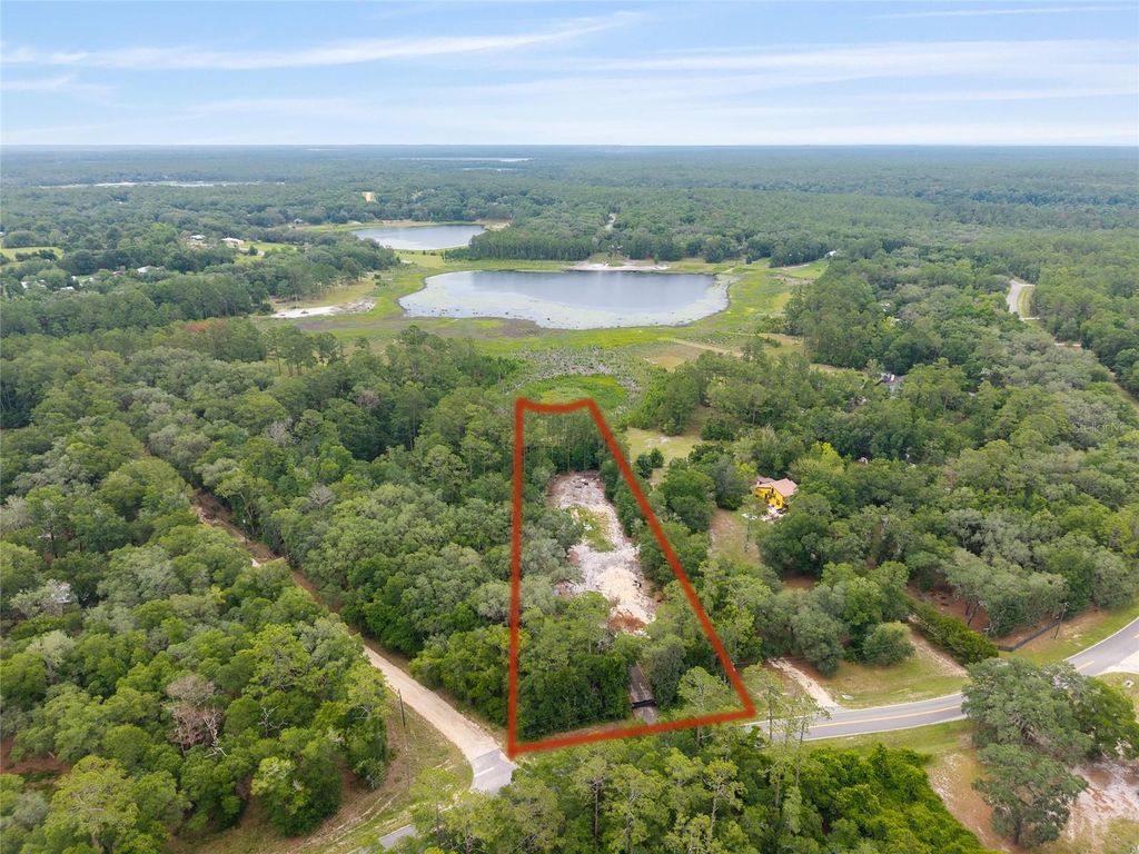 Photo of 261 Ashley Lake Drive, Melrose, FL 32666 (MLS # GC541476)