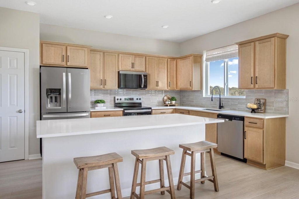 Photo of 3074 Crossland Court, Haines City, FL 33844 (MLS # O6448611)