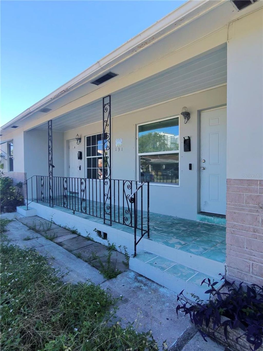Photo of 131 W 35th Street, Riviera Beach, FL 33404 (MLS # TB8441128)