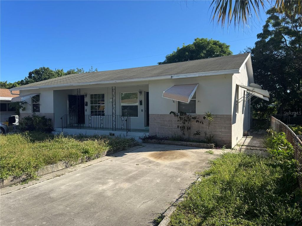 Photo of 131 W 35th Street, Riviera Beach, FL 33404 (MLS # TB8441128)