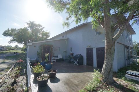 Photo of 53 Bluff Lake Road, Mascotte, FL 34753 (MLS # O6399860)