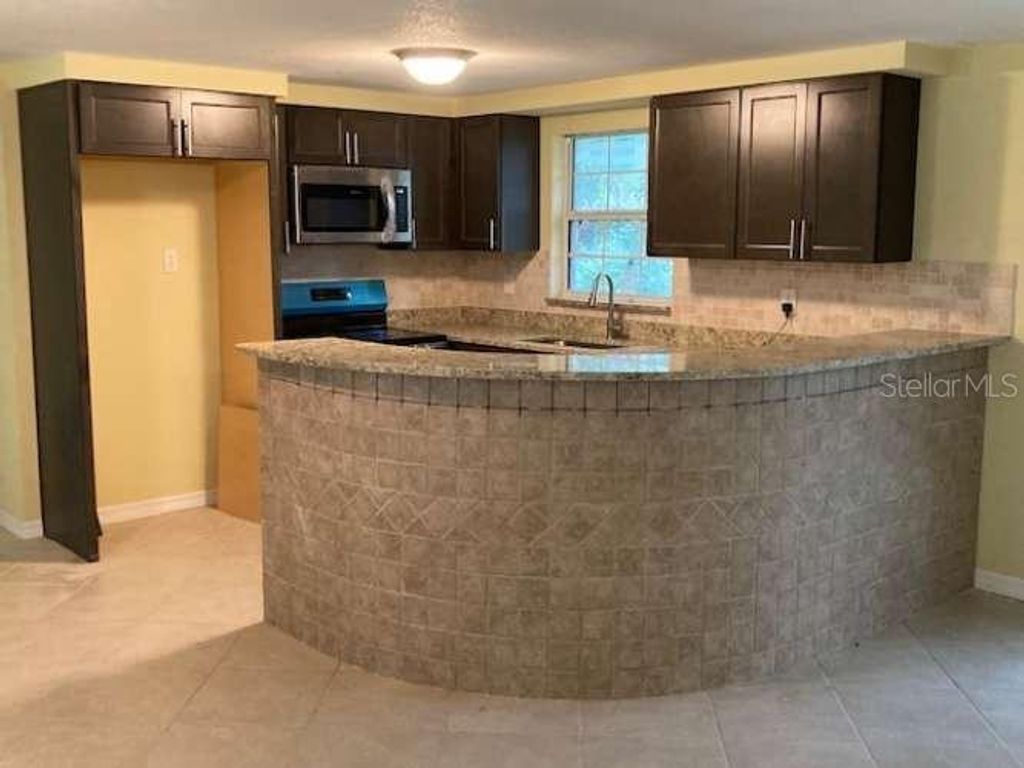 Photo of 17220 Estes Road, Lutz, FL 33548 (MLS # TB8388079)