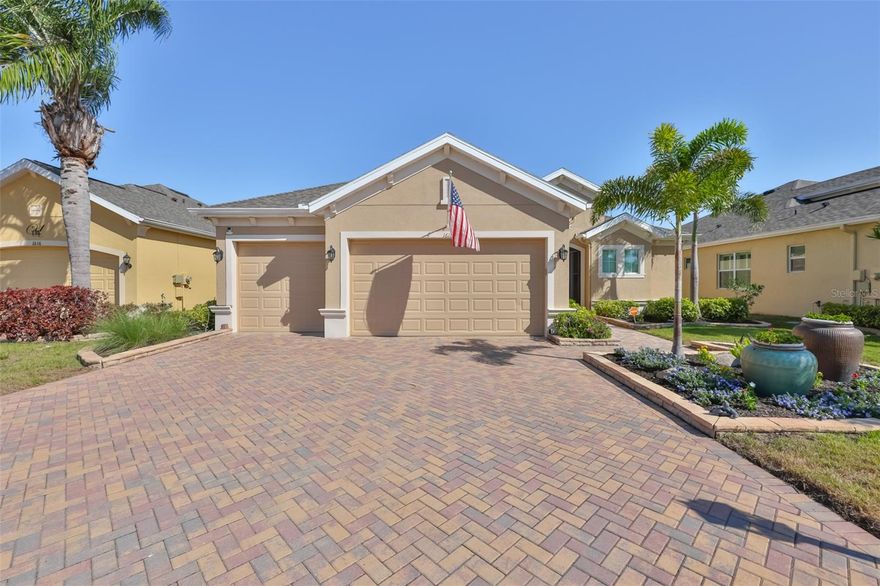 Experience refined Florida living in the 55+ GOLF CART FRIENDLY community of Sun City Center, nestled within the prestigious golf course community of THE RENAISSANCE. Overlooking the 8th fairway, this impressive residence blends scenic beauty with thoughtful upgrades and timeless style. From the moment you arrive, the brick paver driveway, decorative landscape borders, and tropical plantings create striking curb appeal. Step inside to discover refined details like rounded archways, tray ceilings, crown molding, and a neutral palette that sets a warm, elegant tone.  Designed with entertaining in mind, this home features formal living and dining rooms along with a convenient half-bath for guests. An expansive, UPDATED KITCHEN showcases today's most sought-after designs and finishes, effortlessly flowing into the family room and bright dinette.  The spacious owner's suite is fully appointed with two walk-in closets, a soaking tub, and-best of all-split vanities. Your guest suite is privately situated on the opposite side of the home, complete with its own en-suite bath and walk-in closet.  Notable features include: 12/2022 ROOF**2025 HVAC**NEW KITCHEN APLIANCES**PLANTATION SHUTTERS**GUTTER GUARD**WATER SOFTENER**WHOLE HOUSE FILTRATION**  Additional highlights include a spacious 3-car garage with EPOXY FLOORING and built-in storage, as well as an EXTENDED, COVERED brick paver lanai-perfect for relaxing while enjoying the serene golf course and water view.  Just a short golf cart ride away, Club Renaissance offers dining, drinks, social events, fitness classes, Spa Celeste, and a resort-style pool. Residents also enjoy access to all Sun City Center amenities, including over 100+ clubs, pickleball, indoor and outdoor pools, tennis, volleyball, lawn bowling and MORE!  Don't miss the opportunity to experience this exceptional home!  Schedule your visit today and see why you'll want to make it yours!