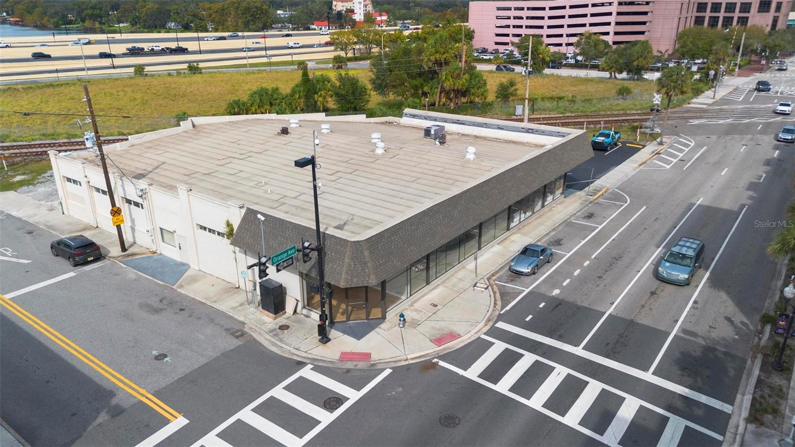 Prime Opportunity in the Heart of Downtown Orlando! Take advantage of this rare chance to own an iconic building in downtown Orlando, boasting unbeatable exposure right on Orange Avenue and visibility from I-4! This highly sought-after property provides endless possibilities for investors and business owners alike. Currently divided into two functional spaces, one side features a spacious, multi-office layout ideal for corporate headquarters or creative workspaces, while the other side is occupied by a Benjamin Moore paint store with a lease in place for just over two years. This section offers ample retail and warehouse space, complete with a loft—perfect for inventory or additional workspace. Whether you’re looking to utilize the building as-is, establish a flagship business, or explore redevelopment opportunities, this property offers a unique opportunity to create a lasting impact in the heart of the city. Embrace the potential to go vertical and expand within one of Orlando’s premier locations!