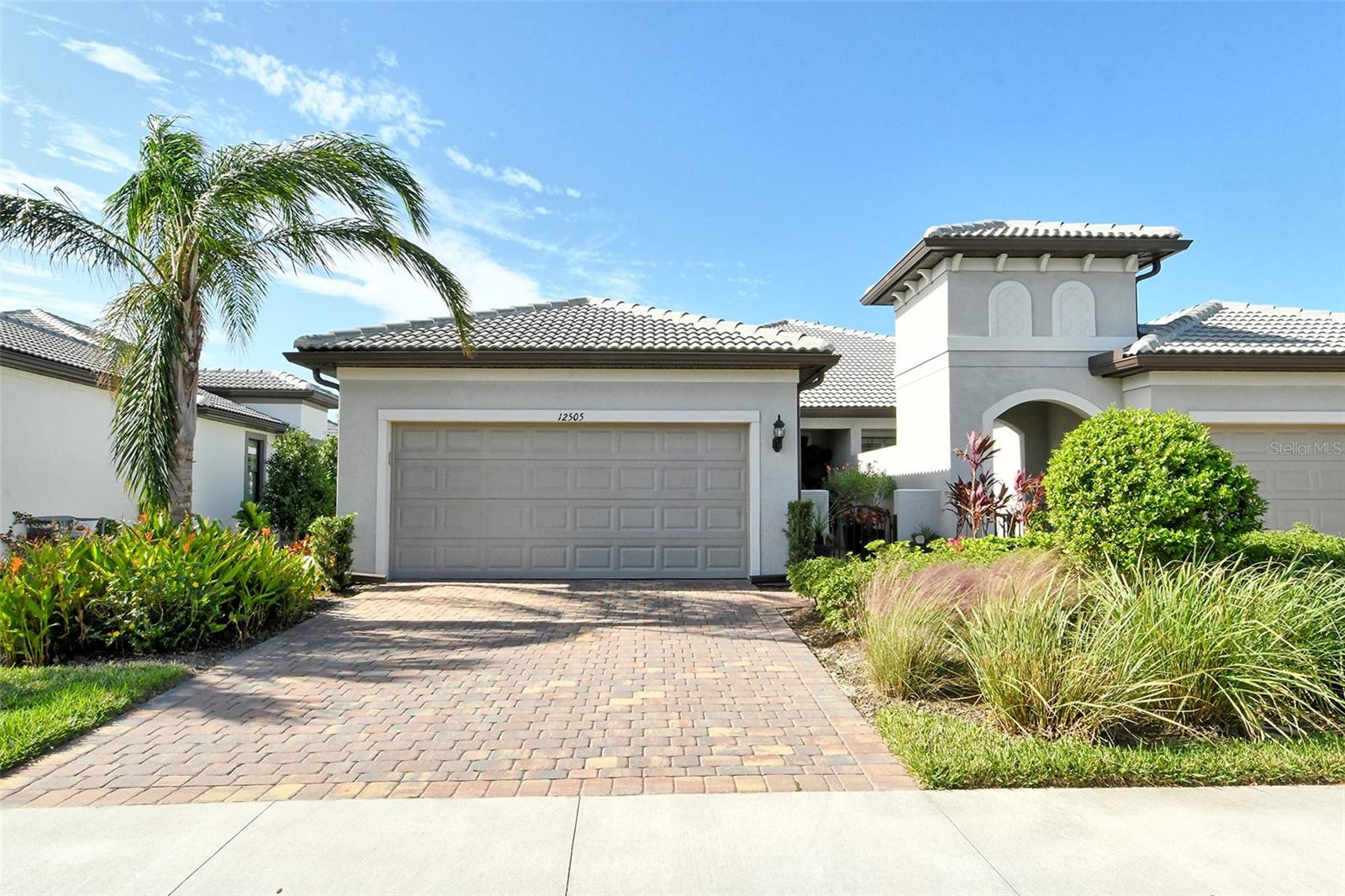 Price Improvement! Stunning Cressida Model Villa in Hammock Preserve
Nestled within the highly desirable, Hammock Preserve, maintenance free community of Palmer Ranch, this immaculate 2021-built Cressida model Villa offers an exceptional blend of modern design, timeless style, and resort-style living. Boasting a pristine, barely-lived-in condition, this 2-bedroom, 2-bathroom Villa includes a flex room that can easily be converted to a 3rd bedroom and is the perfect turnkey opportunity.
Key Features
• Contemporary Interior: 21” ceramic tile flooring throughout, complemented by 9’ ceilings, 8’ smooth panel doors, and neutral paint tones.
• Gourmet Kitchen: High-end stainless steel appliances, sleek quartz countertops, and abundant cabinetry for storage and the ultimate culinary experience.
• Owner's Suite: Spa-inspired bathroom featuring a frameless glass-tiled shower, dual quartz vanities, private water closet, and a spacious custom built walk-in closet.
• Generously-Sized Guest Accommodations: Roomy guest bedroom with space for a king bed and a beautifully designed guest bath with a walk-in shower.
• Open-Concept Living: Sunlit living and dining areas seamlessly flow to the outdoor space, perfect for entertaining or relaxing.
Step outside to your screened-in, paver patio lanai overlooking a serene backyard with ample space to add a pool. The low-maintenance epoxy-coated garage with built-in wall storage slots adds extra convenience.
This beautifully designed home is situated in a vibrant neighborhood that boasts a wealth of amenities, including:
• An elegant clubhouse, available for private event rentals
• A full fitness center
• A large heated swimming pool with two lap lanes and a relaxing spa
• A barefoot bar for casual gatherings
• Tennis, bocce ball, and pickle ball courts
• A community fire pit perfect for evenings under the stars
• A dog park and fishing pier
Conveniently located just minutes from the stunning Sarasota and Nokomis Beaches, this villa also offers quick access to I-75, exceptional shopping, dining options, and a top-rated school district.
Don’t miss your chance to call this exceptional property home—schedule your private tour today and start living the Hammock Preserve lifestyle!