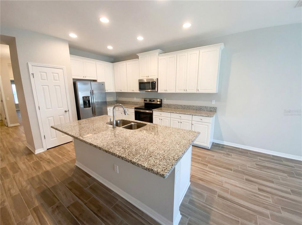 Photo of 7423 Pool Compass Loop, Wesley Chapel, FL 33545 (MLS # O6383255)