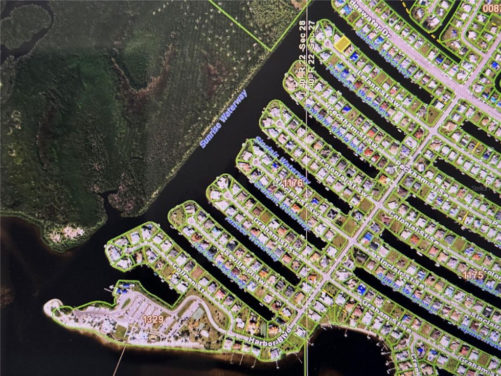 Photo of 140 Leland Street SW, Port Charlotte, FL 33952 (MLS # C7519378)