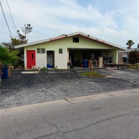 Photo of 439 129th Avenue E, Madeira Beach, FL 33708 (MLS # TB8449133)