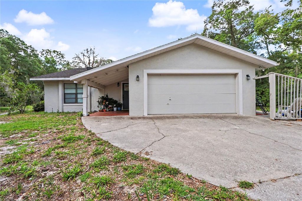 Photo of 20250 SW 93 Lane Road, Dunnellon, FL 34431 (MLS # OM725162)