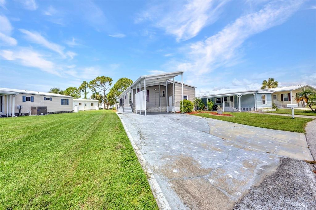 Photo of 5748 Holiday Park Boulevard, North Port, FL 34287 (MLS # C7512668)