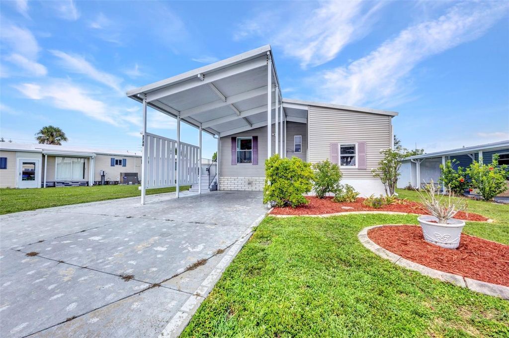Photo of 5748 Holiday Park Boulevard, North Port, FL 34287 (MLS # C7512668)