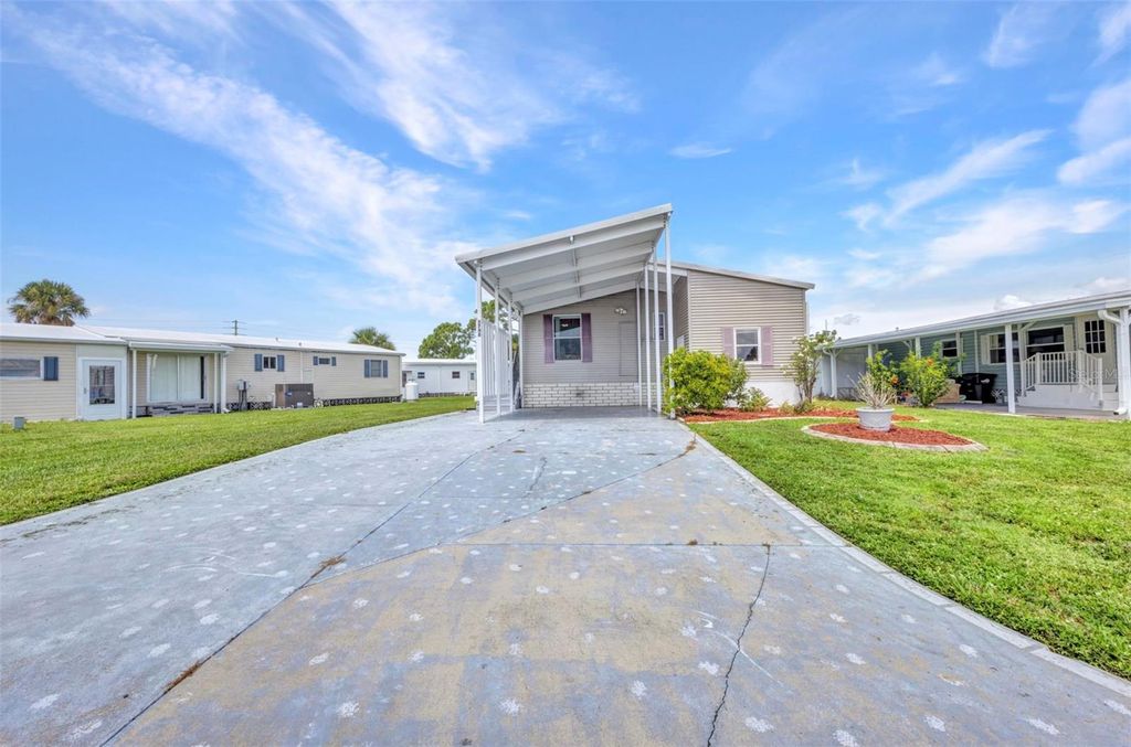 Photo of 5748 Holiday Park Boulevard, North Port, FL 34287 (MLS # C7512668)