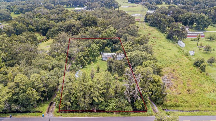 Huge lot on nearly an acre (.95 acres) zoned agriculture single family (AS-1).  A perfect opportunity to customize this home to make it your own as an open canvas or build your dream home.  Conveniently located to 301 and I-4.