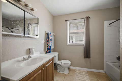Tiny photo for 818 NE 9th Avenue, Ocala, FL 34470 (MLS # OM726494)