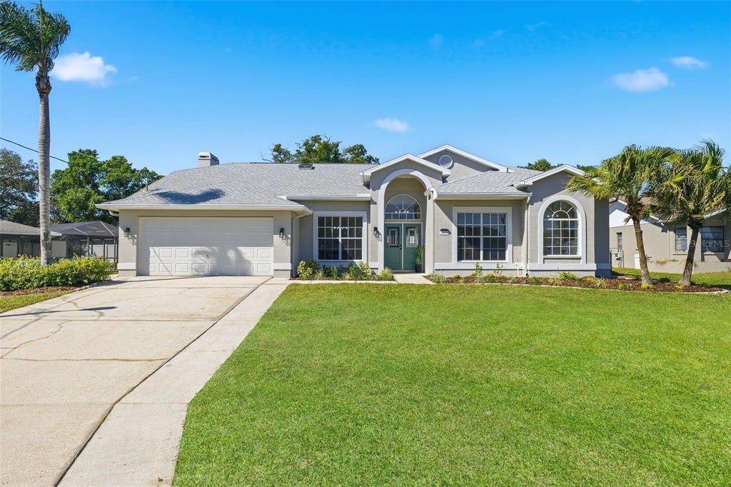 Photo of 1379 Henry Avenue, Spring Hill, FL 34608 (MLS # TB8560234)