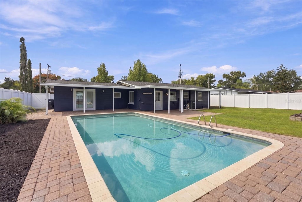 Photo of 3021 Touraine Avenue, Orlando, FL 32812 (MLS # O6452495)