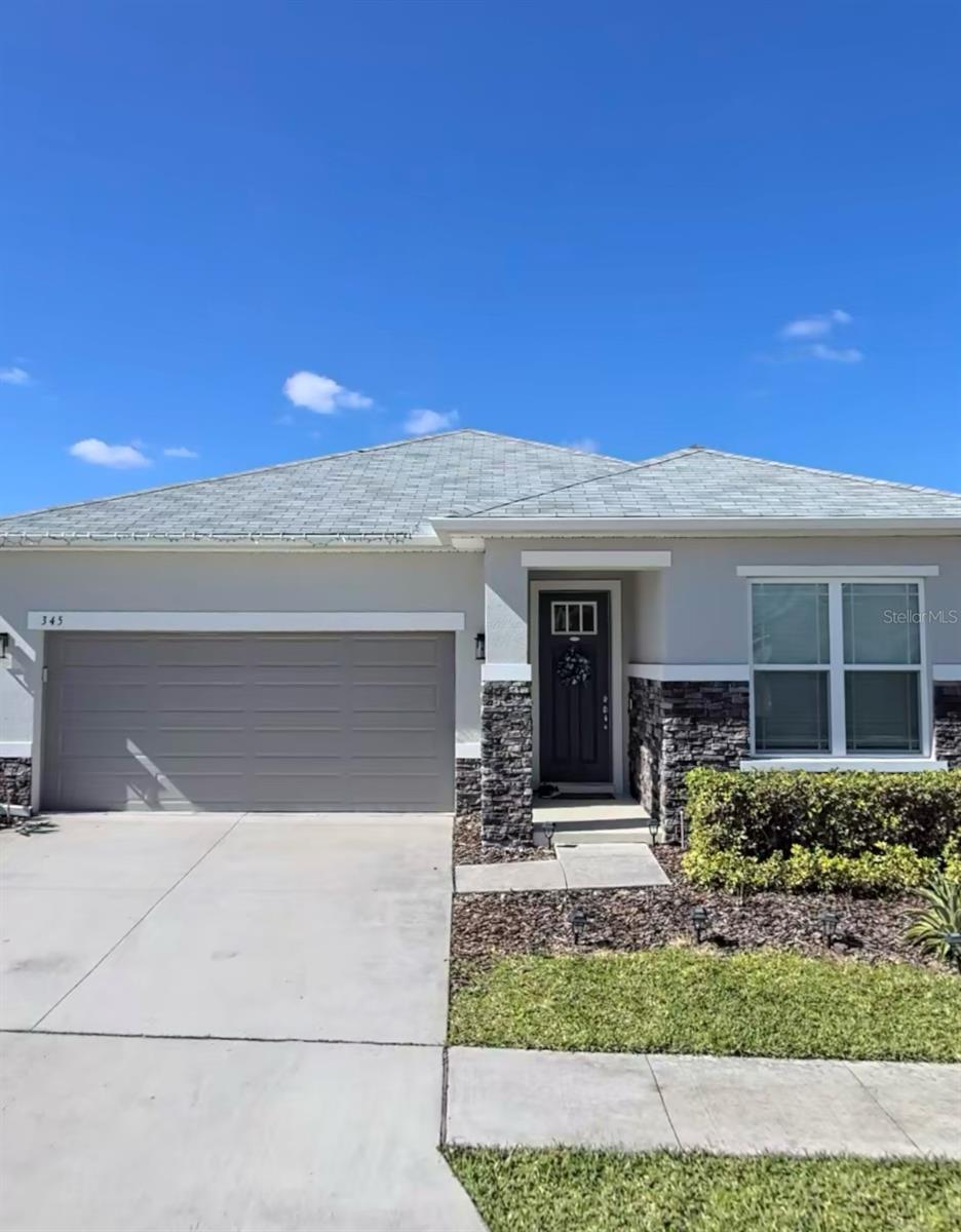 Photo of 345 Casa Verano Lane, Davenport, FL 33897 (MLS # O6443336)
