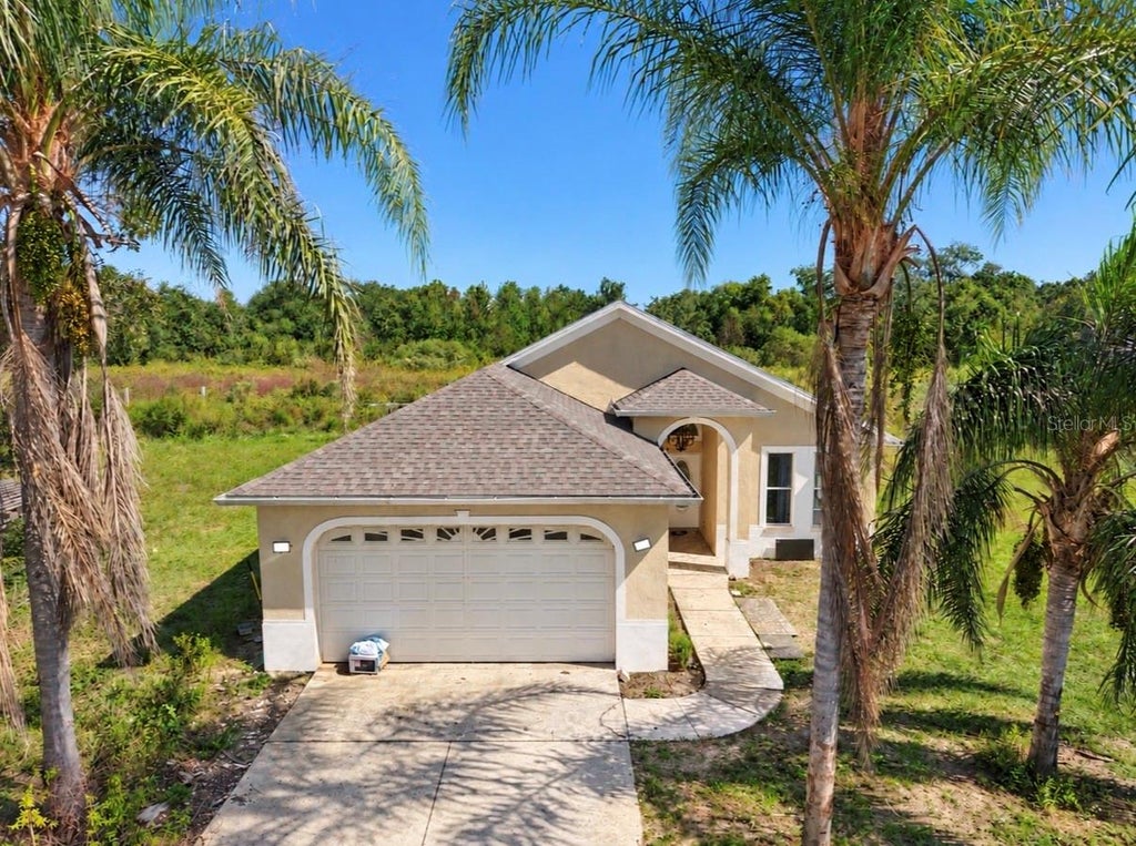 Photo of 426 Diamond Acres Road, Davenport, FL 33837 (MLS # O6452185)