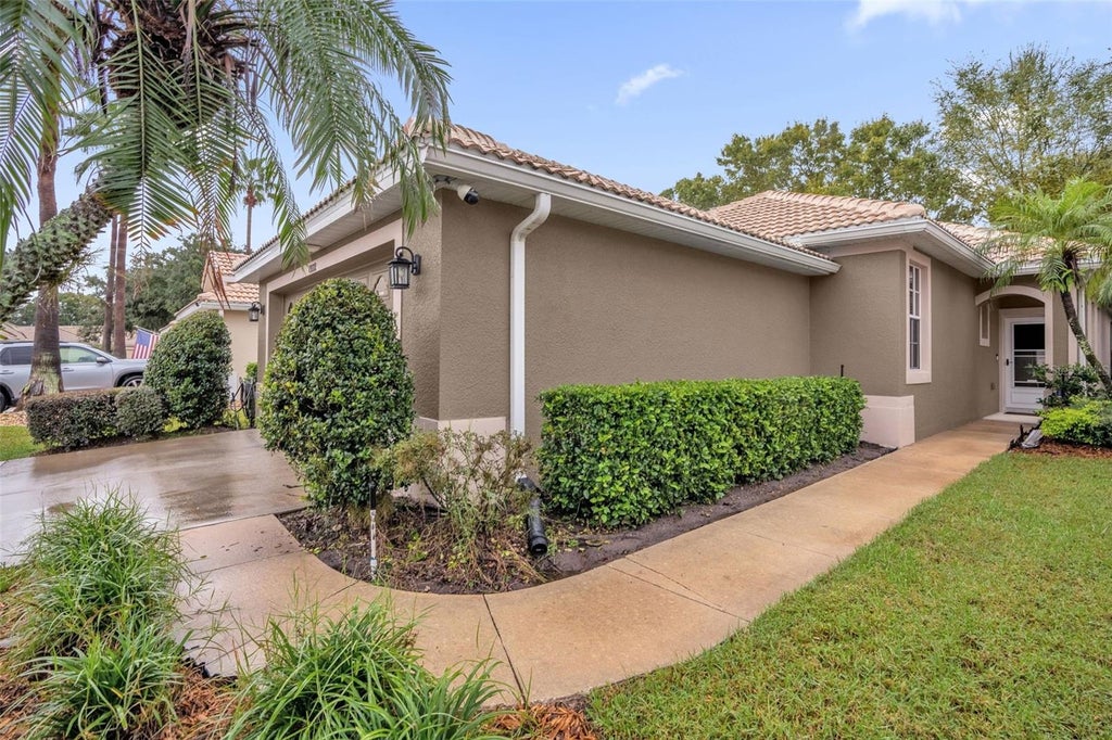 Photo of 8002 Saint Andrews Way, Mount Dora, FL 32757 (MLS # O6448326)