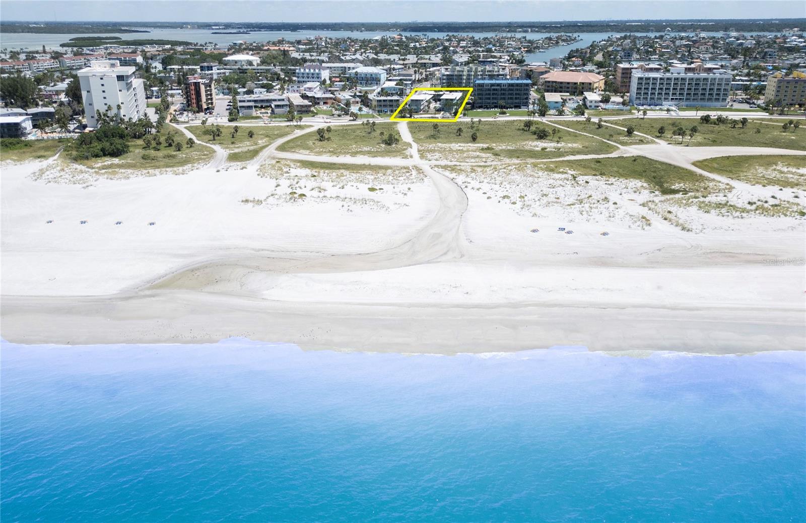 CALLING ALL BEACH LOVERS! YES, CALLING ALL BEACH LOVERS! BRAND NEW ON THE MARKET! WELCOME TO THE BEACH! Wait till you see this DIRECT BEACHFRONT updated renovated RESORT with a BRAND NEW POOL completed mere weeks ago, offering you this fantastic opportunity! What a great value, priced to sell quickly and easily! You'll love the MODERN NEUTRAL EXPENSIVE upgrades #9 unit offers, capable of bringing in the highest rental potential with THESE BRAND NEW UPGRADES JUST COMPLETED, (DOCUMENTS/REPORTS/INSPECTIONS INCLUDED for your easy review). BEAUTIFUL DURABLE FLOORING perfect for the beach, EXPENSIVE COMFORTABLE *KING BED*, GORGEOUS FULL STAINLESS STEEL KITCHEN even offering a FULL STOVETOP AND OVEN -- for a STUDIO! Your own beachfront parking space, your own private owners storage locker area for beach toys & beach bikes, RENOVATED OWNER'S LOUNGE, and so much more!
Located on world renowned beautiful pristine expansive Treasure Island Beach, which again, was recently voted by the public in a recent *USA TODAY 10 BEST READERS' CHOICE AWARDS* and this time was voted as one of the TOP 3 BEACHES IN FLORIDA!* 3rd after Clearwater Beach! Wow, Impressive! And with an esteemed address of *Gulf Boulevard* Tropic Terrace Condo Hotel is a DIRECT BEACHFRONT RESORT on the quiet coastal community and barrier island of Treasure Island. "TI" as the locals like to call it, is nestled quietly between larger, busier Clearwater Beach and busy St Pete Beach. Here at the completely remodeled vintage hotel resort community of Tropic Terrace, remodeled after Helene, this utterly relaxing, perfectly remodeled studio style hotel room (with a MODERN FRESH HOTEL VIBE FEEL) #9 Condo features a true fully furnished fresh bright exceptionally clean condo, located easily on the ground floor, in the renovated mid-century modern boutique hotel, circa 1950 and upon seeing Tropic Terrace, will bring you back in time and delight you, not only with it's renovations but moreso with it's great list price and opportunity! You won't find a turnkey fully renovated MODERN TOES IN THE SAND beachfront treasure like this for this price!
Exceptional POOLFRONT Condo #9 along with tropical Tropic Terrace gives you everything on your checklist. Your weekends will definitely feel more relaxing, with bright sunshine, palm trees, beautiful aqua waters, toes in the sand beach days, while enjoying a cool swim in TT's BRAND NEW POOL (just opened), along with evenings of happy hours and dinners, dining alfresco at popular TI restaurants, enjoying postcard-like sunsets -- your weekends never looked better with Tropic Terrace's NEWLY REMODELED MODERN HOTEL VIBE #9 as your new turn key Oasis beach getaway when you invest in your very own beachfront sanctuary that is so affordable, you'll be wanting to see it immediately! Call NOW for your tour of this amazing tropical property and great fully furnished unit 9 -- ready for IMMEDIATE OCCUPANCY either as owner or rent out for guests via the on-site prop. mgmt rental company great ROI's! According to previous profit & loss rental reports, this should cover your yearly expenses, HOA, taxes, etc. And with a HOA that generously covers everything - ELECTRICITY, yes, includes electricity along with water, sewer, trash/garbage, cable tv, wifi, parking spot, owners lounge, pool maintenance, insurance, lawncare/landscaping, pest control, on site rental mgr, etc. (you only pay property taxes). CALL TODAY-COME TO THE BEACH. EASY SHOW!