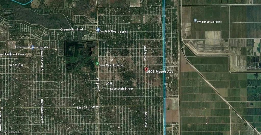 Photo of 1606 Moore Avenue, Lehigh Acres, FL 33972 (MLS # O6393084)