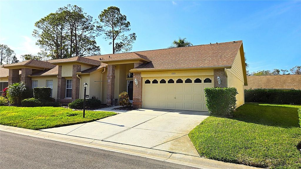 Photo of 6521 Pine Walk Drive, New Port Richey, FL 34655 (MLS # TB8464287)