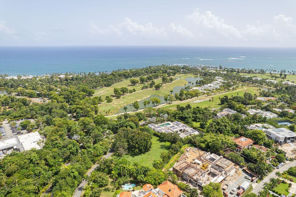 Introducing a rare opportunity to build your dream home in one of Puerto Rico's most exclusive gated communities—The Dorado Beach Estates. This expansive corner lot, larger than any inside Dorado Beach East or Dorado Country Estates, offers nearly 1.5 acres of untouched, flat land, ready for you to create your ultimate estate home. Imagine a 20,000-square-foot luxury home, a state-of-the-art tennis court, a sparkling pool with a pool house, and an outdoor kitchen, all surrounded by lush landscaping that ensures privacy and completes the island lifestyle.
The possibilities are endless to craft your dream estate amidst neighboring homes valued at over $30-40 million. With its prime location, unparalleled privacy, flat terrain, and substantial acreage within the gates of the Dorado Ritz-Carlton, Lot 16 at Dorado Beach Estates offers a truly unique real estate opportunity for the discerning buyer.