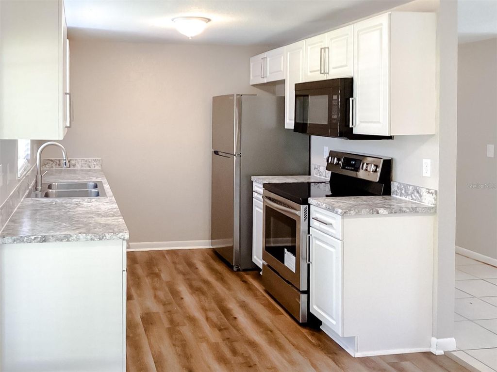 Photo of 3613 Wisperbreath Lane, Tampa, FL 33619 (MLS # TB8500934)