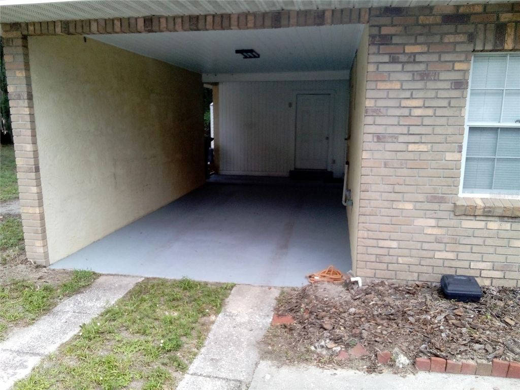 Photo of 906 Oak Drive, Leesburg, FL 34748 (MLS # W7886051)
