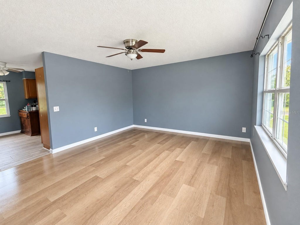 Photo of 1016 N Forrest Avenue, Kissimmee, FL 34741 (MLS # O6450190)