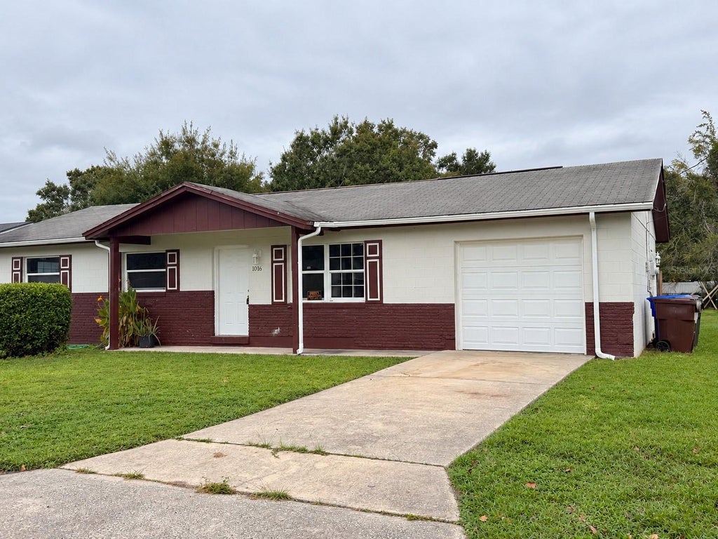 Photo of 1016 N Forrest Avenue, Kissimmee, FL 34741 (MLS # O6450190)
