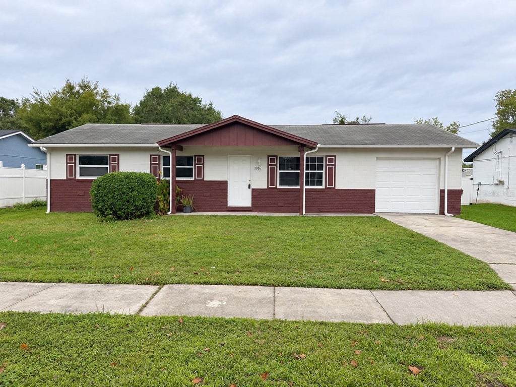 Photo of 1016 N Forrest Avenue, Kissimmee, FL 34741 (MLS # O6450190)
