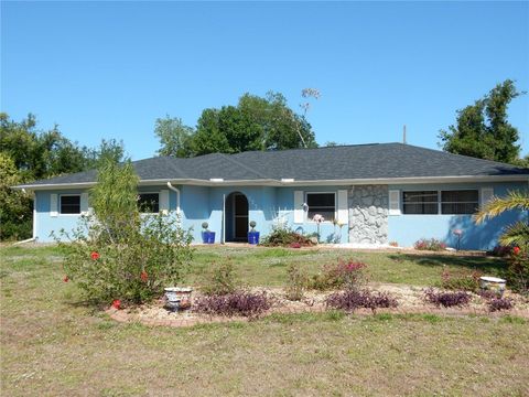 Photo of 1233 Dewhurst Street, Port Charlotte, FL 33952 (MLS # C7508510)