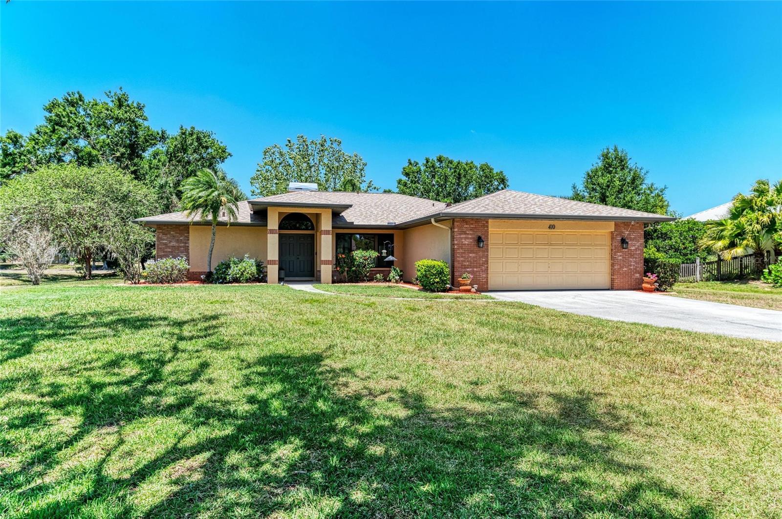 Back on the Market — A rare chance you don’t want to miss - a home in the highly sought-after Mill Creek community that truly has it all. Proudly maintained by its original owners and hitting the market for the very first time, this solidly built home sits on a premium homesite on over 1-acre lot with peaceful lake views and plenty of space to stretch out and enjoy the outdoors. From the moment you enter through the double doors, you’re greeted with a spacious living area featuring a vaulted ceiling, a dramatic fireplace, and two sets of French doors that flood the space with light and offer stunning views of the screened-in pool, lush backyard, and lake beyond. The formal dining room, complete with IMPACT windows, is perfect for hosting family dinners or holiday get-togethers. The home has great bones, and a layout designed for everyday comfort, offering the perfect canvas to personalize or update to suit your style. The kitchen is full of potential with ample cabinet space and a sunny breakfast nook for casual meals. The split floor plan gives the primary suite extra privacy, with its own dual closets, en-suite bathroom, and direct access to the southeast-facing patio—ideal for morning coffee or quiet evenings outside. Two additional guest bedrooms and a full bath, used as the pool bath, are thoughtfully placed on the other side of the home for added privacy. Outside, you’ll find an expansive covered terrace that stretches along most of the home, overlooking an electric heated pool and gas heated spa-perfect for year-round enjoyment. Other highlights include a long-extended driveway for extra parking, a new roof (2024) and IMPACT windows (2019), giving you peace of mind for years to come. Mill Creek is known for its large estate-style lots, low HOA fees, and no CDD fees—all while being close to top-rated schools, shopping, dining, and major roads. Plus, you’re just minutes from Lakewood Ranch and a short drive to Florida’s beautiful Gulf beaches. If you’ve been waiting for the perfect blend of location, space, and potential, this is it. Come see what makes this Mill Creek home so special—schedule your private showing today!